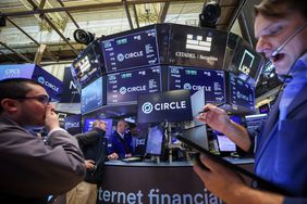 Traders working on the floor of the New York Stock Exchange on Thursday.