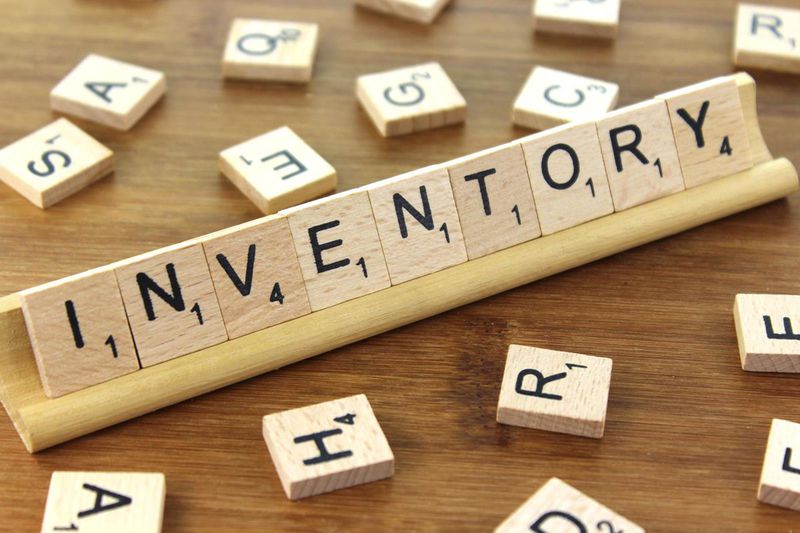 The word inventory spelled out on a Scrabble game.