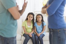 Children with arguing adults