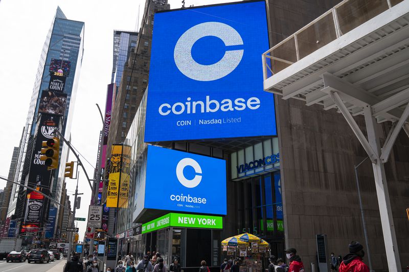 Coinbase signage during the company's initial public offering (IPO) at the Nasdaq market site April 14, 2021 in New York City. 