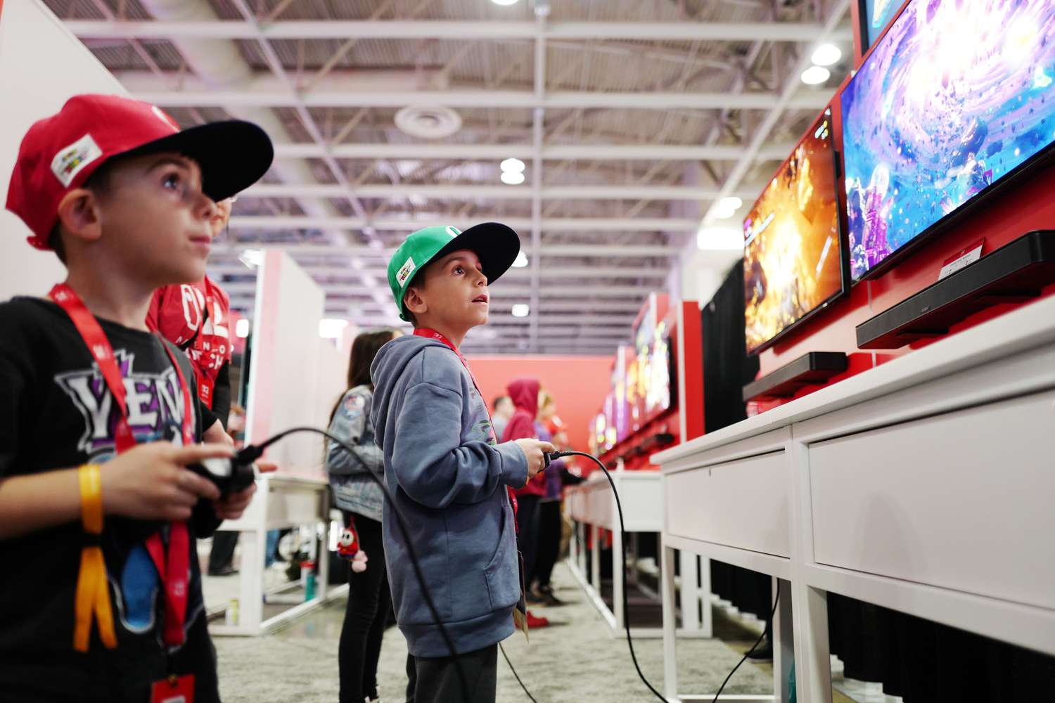 Brothers try out a Nintendo Switch 2. 