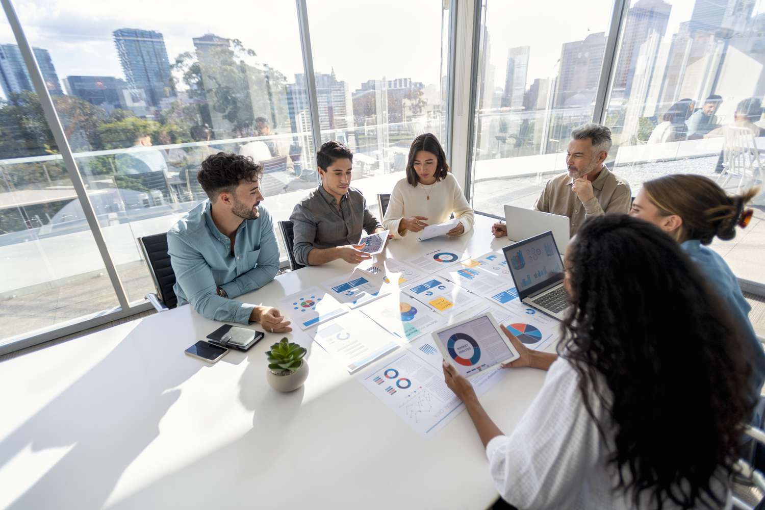 Group of business people meeting around a table