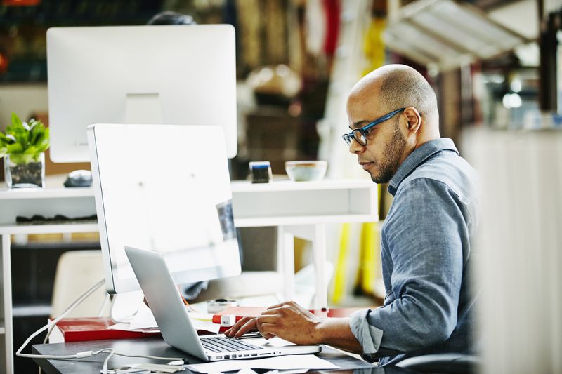 Person at workstation in startup office