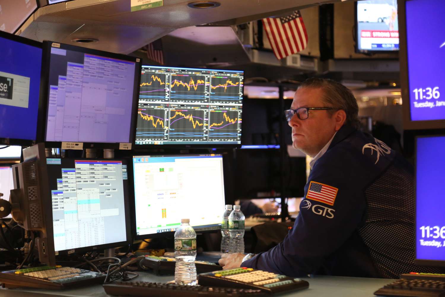 A trader works on the floor of New York Stock Exchange in New York,