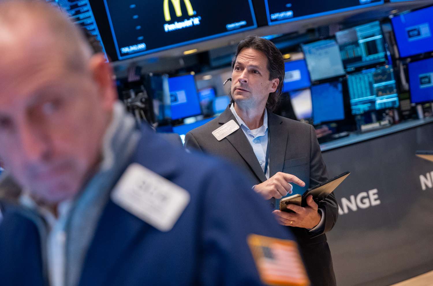 Traders work on the floor of the New York Stock Exchange (NYSE).