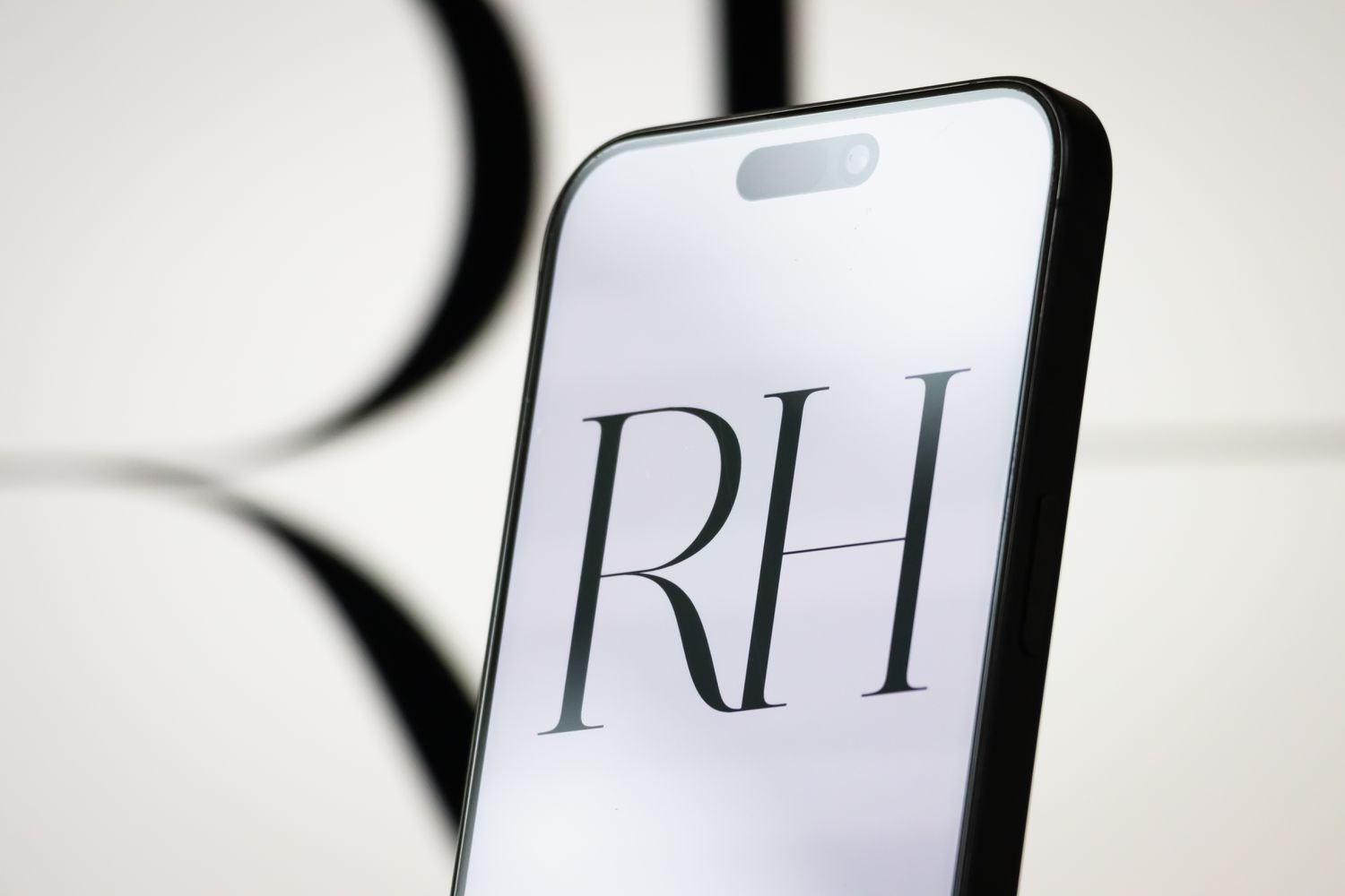 RH logo displayed on a smartphone.