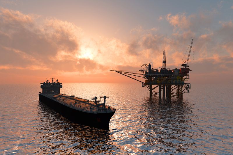 Oil Rig with ship on ocean