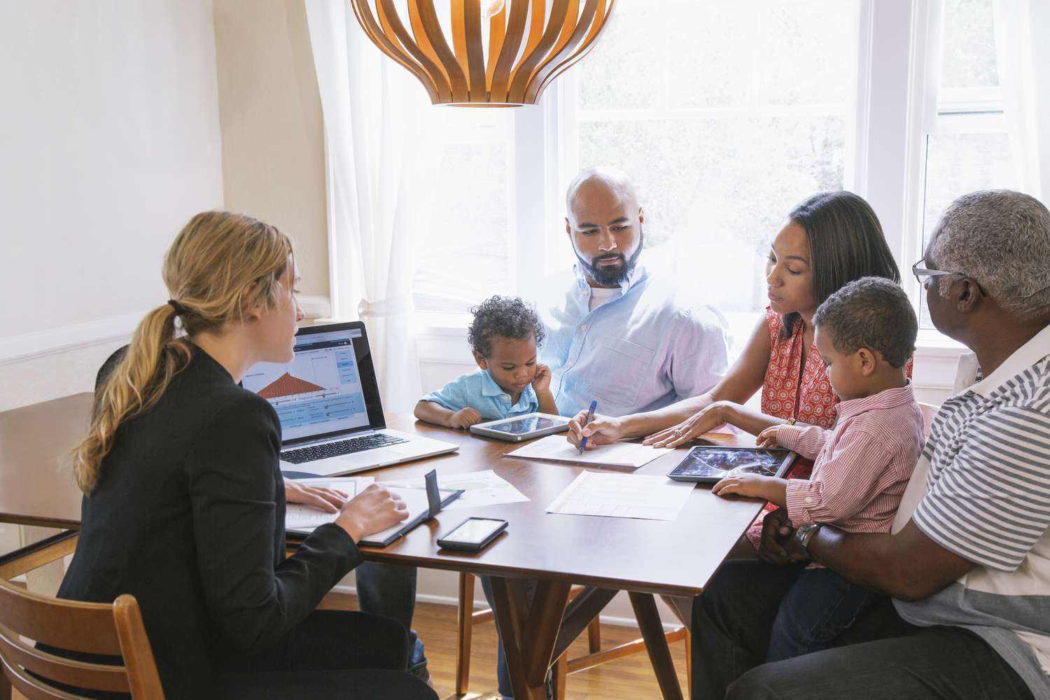 Financial advisor talking to clients