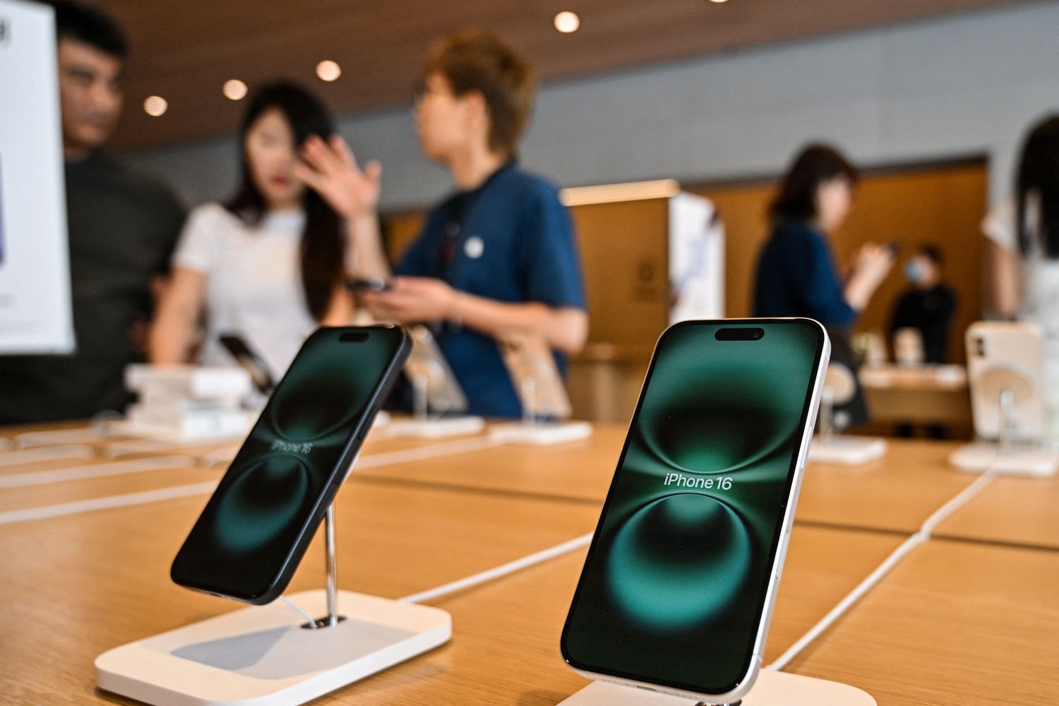 Iphone 16 are displayed in an Apple store in the Jing'an district in Shanghai.