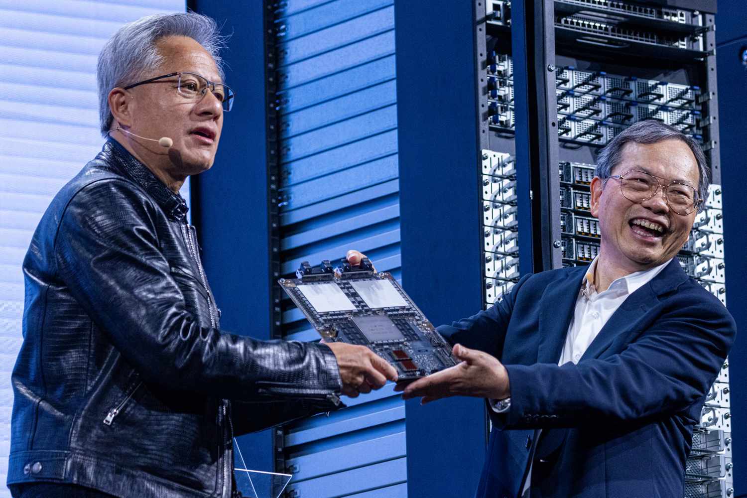 Nvidia CEO Jensen Huang, left, and Super Micro Computer CEO Charles Liang, right, uring the Computex conference in Taipei, Taiwan, on June 5, 2024.