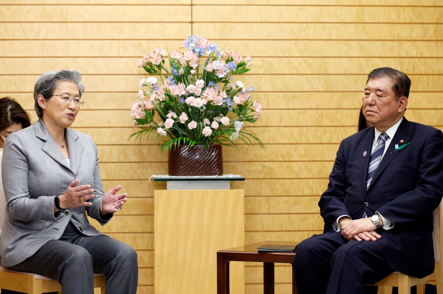 Japanese Prime Minister Shigeru Ishiba listens to Lisa Su, chairwoman and CEO of AMD, at the start of their meeting at the prime minister's official residence in Tokyo on April 17, 2025. 