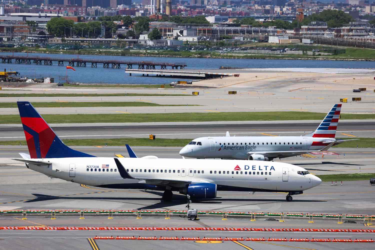 A Delta plane and an American Airlines plane.