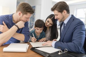 Family Signing Life Insurance Policy