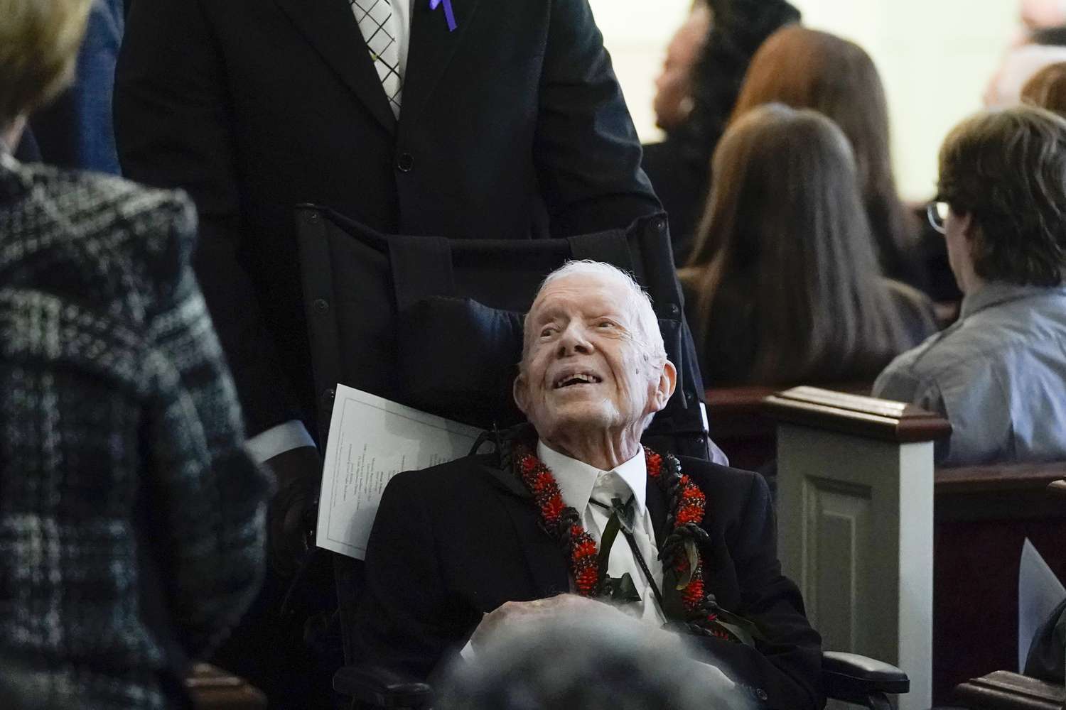 Former President Jimmy Carter greets people as he leaves after the funeral service for his wife, former first lady Rosalynn Carter, at Maranatha Baptist Church on November 29, 2023,