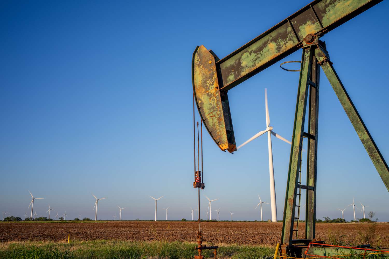 An oil pump jack is shown in a field in Nolan, Texas.