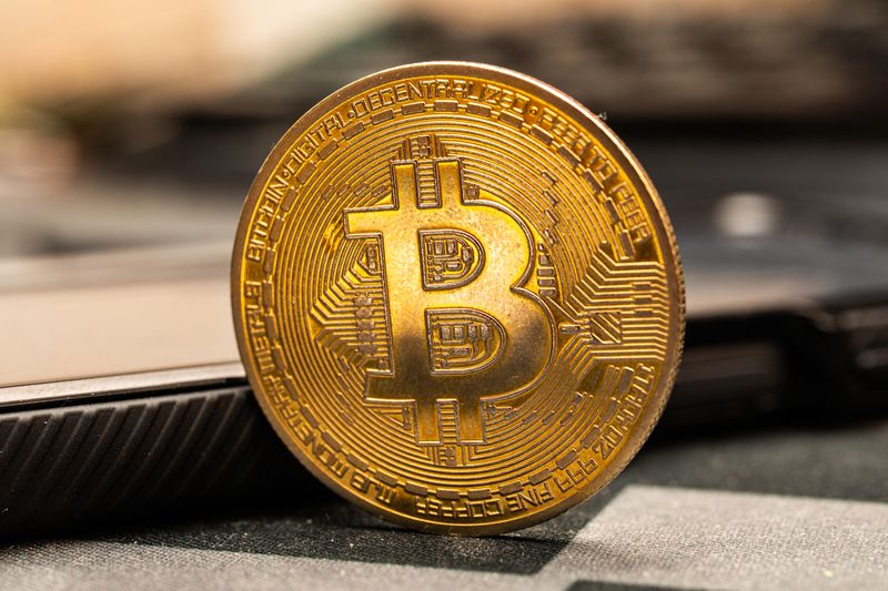 Bitcoin cryptocurrency cryptomonnaie coin placed on a desk in Clermont-Ferrand, France, on May 16, 2025