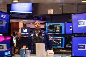 Traders work on the floor of the New York Stock Exchange on September 18, 2024 in New York City