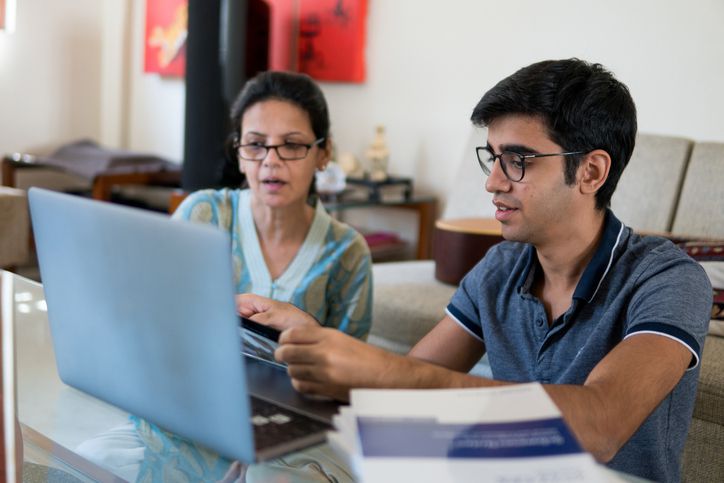 Mother and son researching the Coverdell Education Savings Account