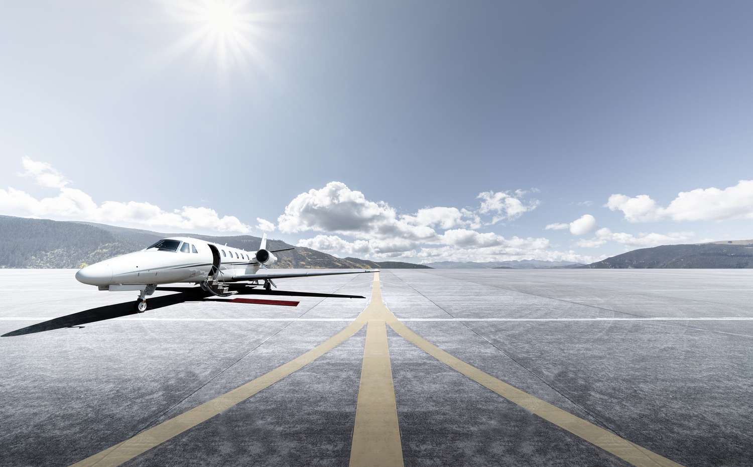 A private jet on a runway.