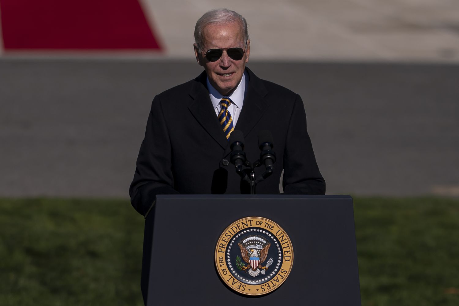 President Biden standing at a podium