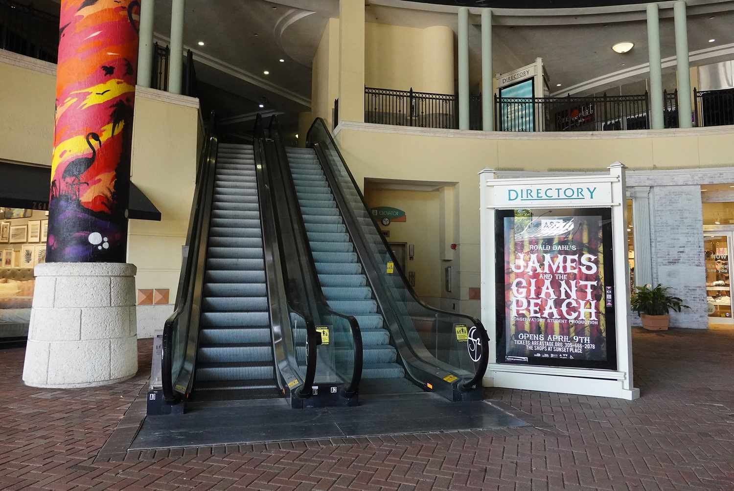 empty shopping mall escalator