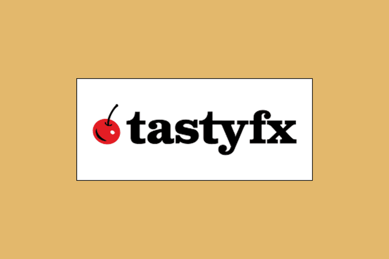 Image shows tastyfx's logo in a white box against a mustard-colored background.
