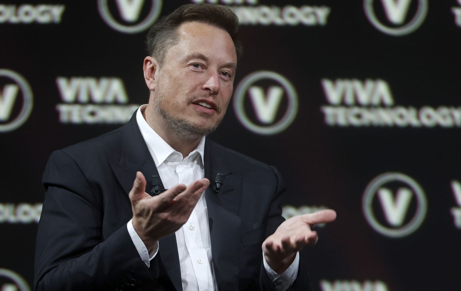 Chief Executive Officer of SpaceX and Tesla and owner of Twitter, Elon Musk gestures as he attends the Viva Technology conference dedicated to innovation and startups at the Porte de Versailles exhibition centre on June 16, 2023 in Paris, France. 