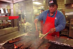 Famous Dave Anderson cooks up a passel o' ribs at his Maple Grove restaurant