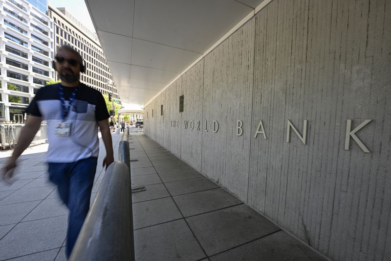 Man walking on the street beside the World Bank