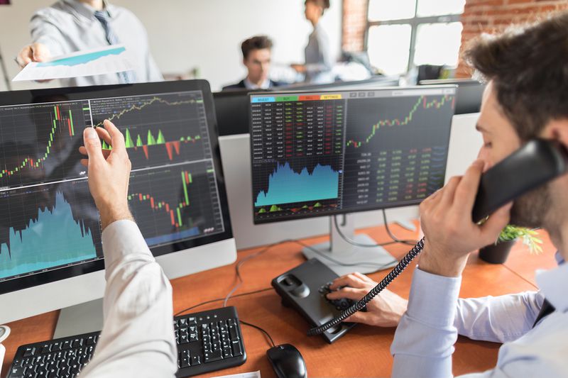 Business Team Deal on a Stock Exchange