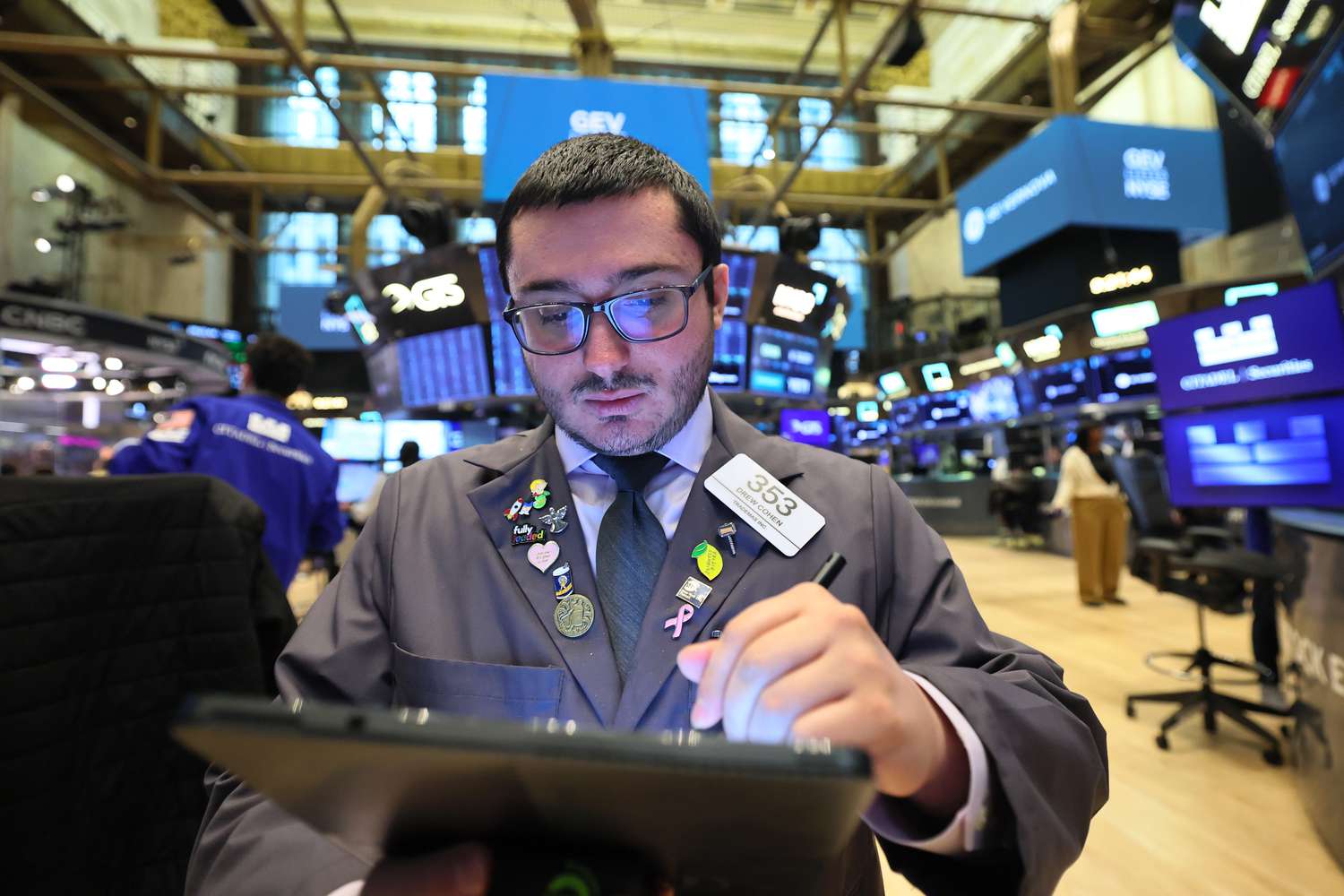 Traders work on the floor of the New York Stock Exchange