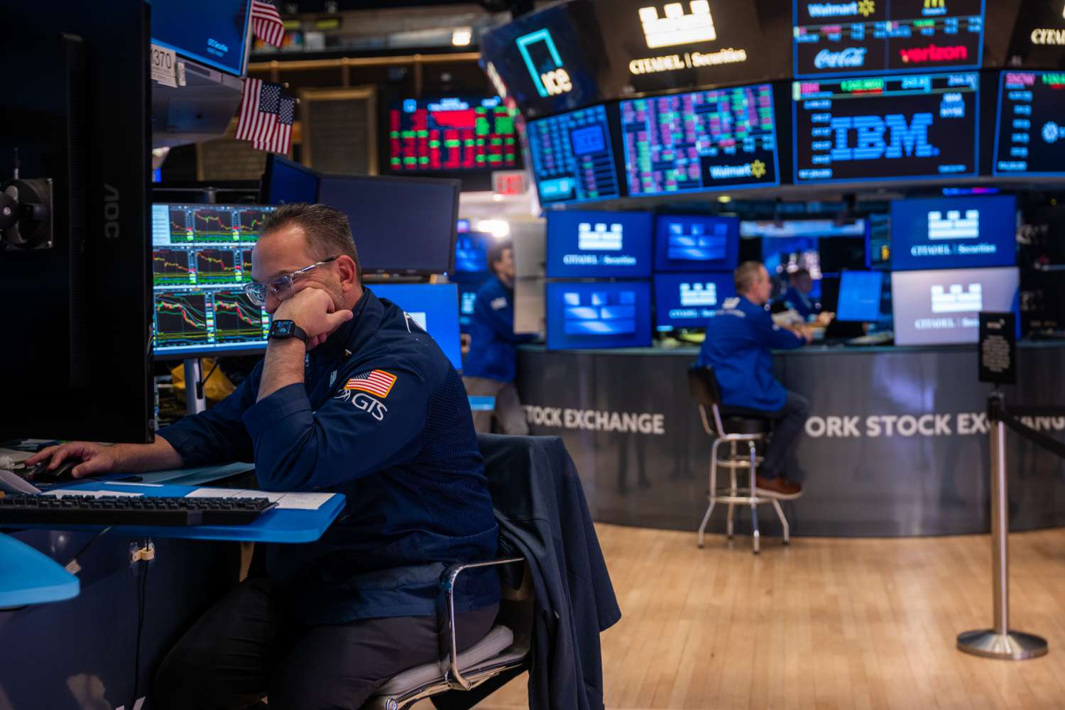 Traders work on the floor of the New York Stock Exchange