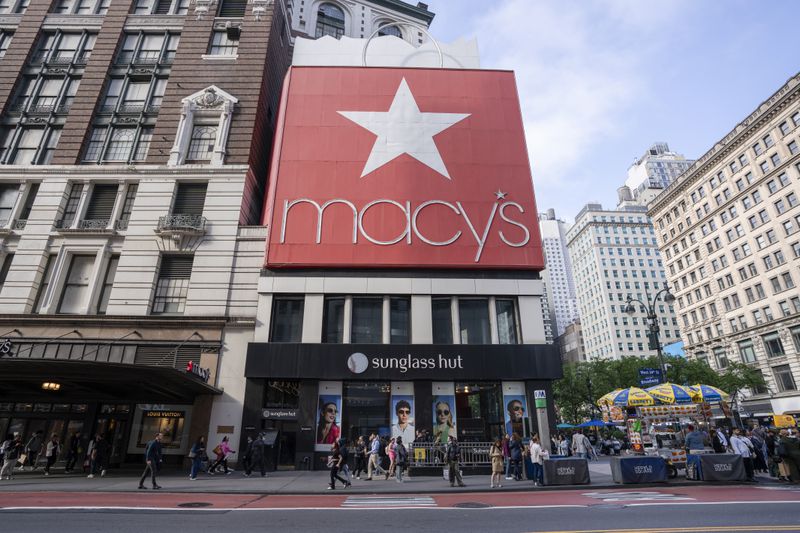 People walk in front of the Macy's Herald Square store on May 15, 2025 in New York City