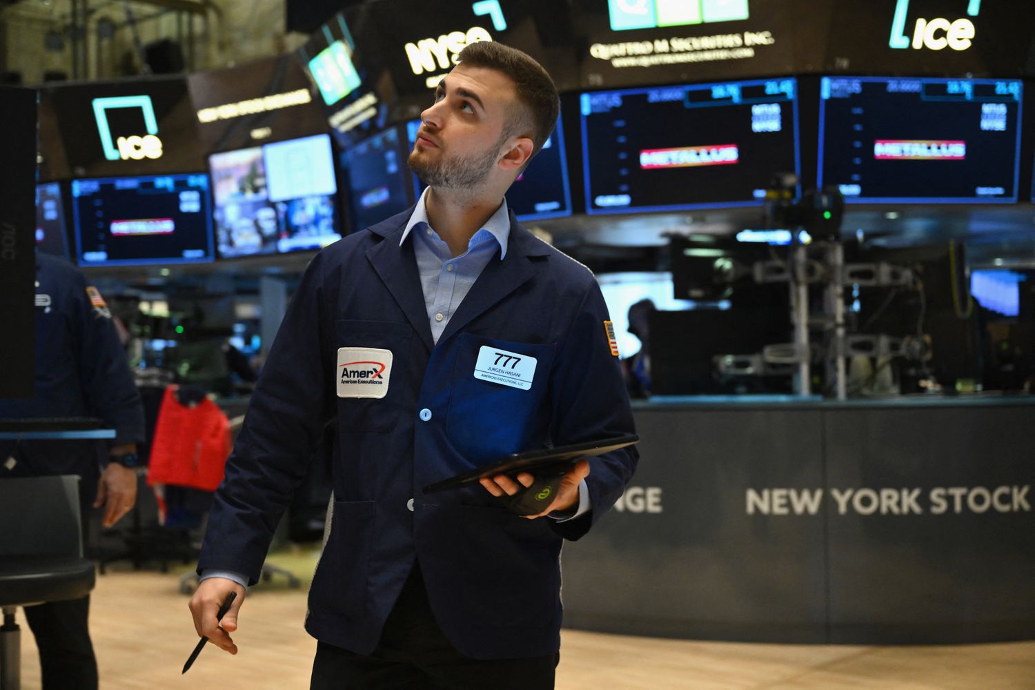 A trader works on the floor of the New York Stock Exchange (NYSE) during morning trading on March 4, 2024 in New York City.