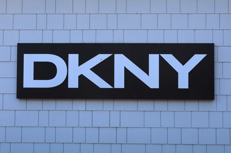 A DKNY sign hangs in front of their store at the Woodbury Common Premium Outlets shopping mall in Central Valley, New York