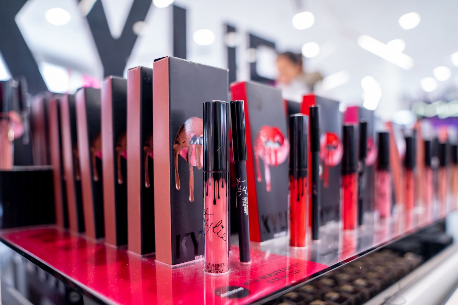 Close up of lipstick displayed at cosmetics store. 