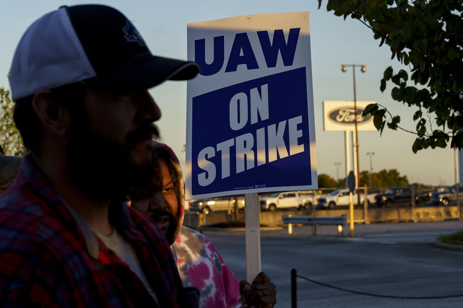 United Auto Worker members on strike at a Ford plant.