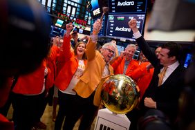 Scott McFarlane, chief executive officer of Avalara Inc., center, cheers during the company's initial public offering (IPO) on the floor of the New York Stock Exchange (NYSE) in New York, U.S., on Friday, June 15, 2018.