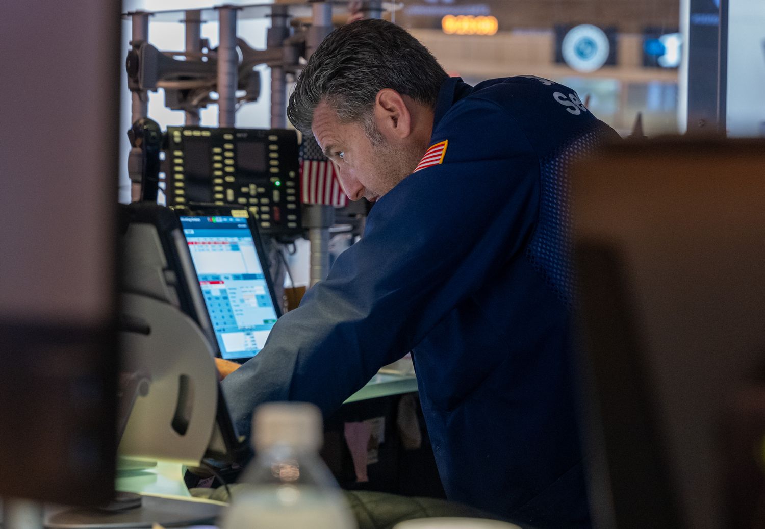 Traders work on the floor of the New York Stock Exchange.