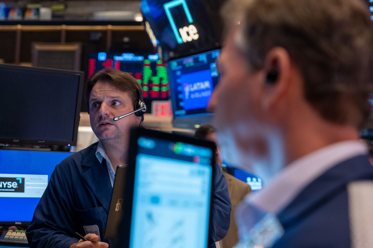 Traders work on the floor of the New York Stock Exchange 
