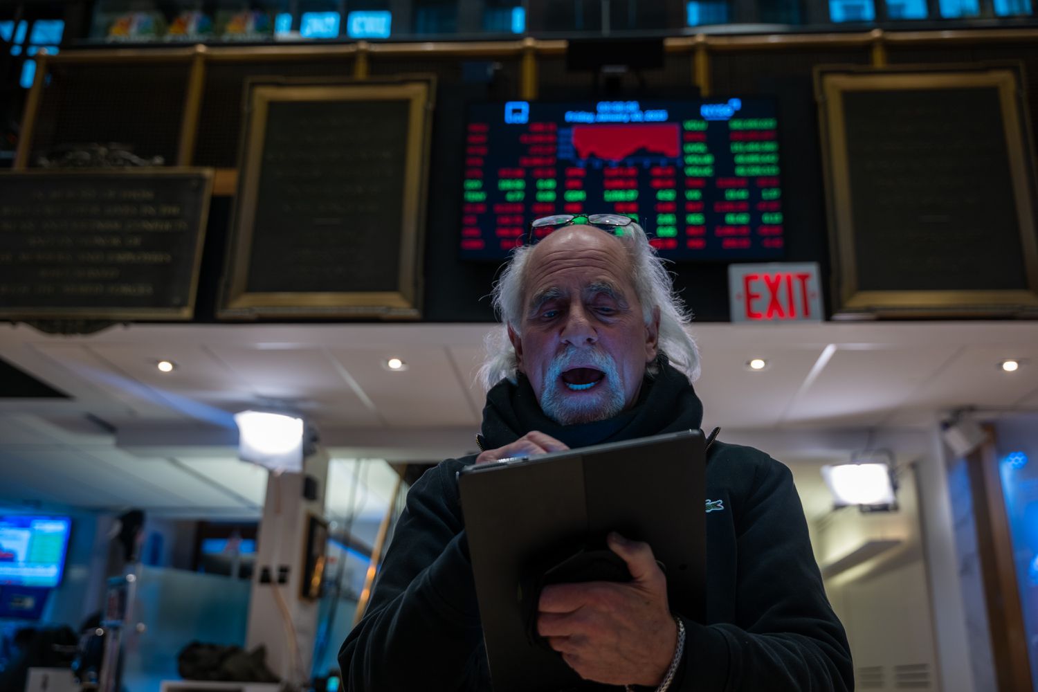 Traders work on the floor of the New York Stock Exchange