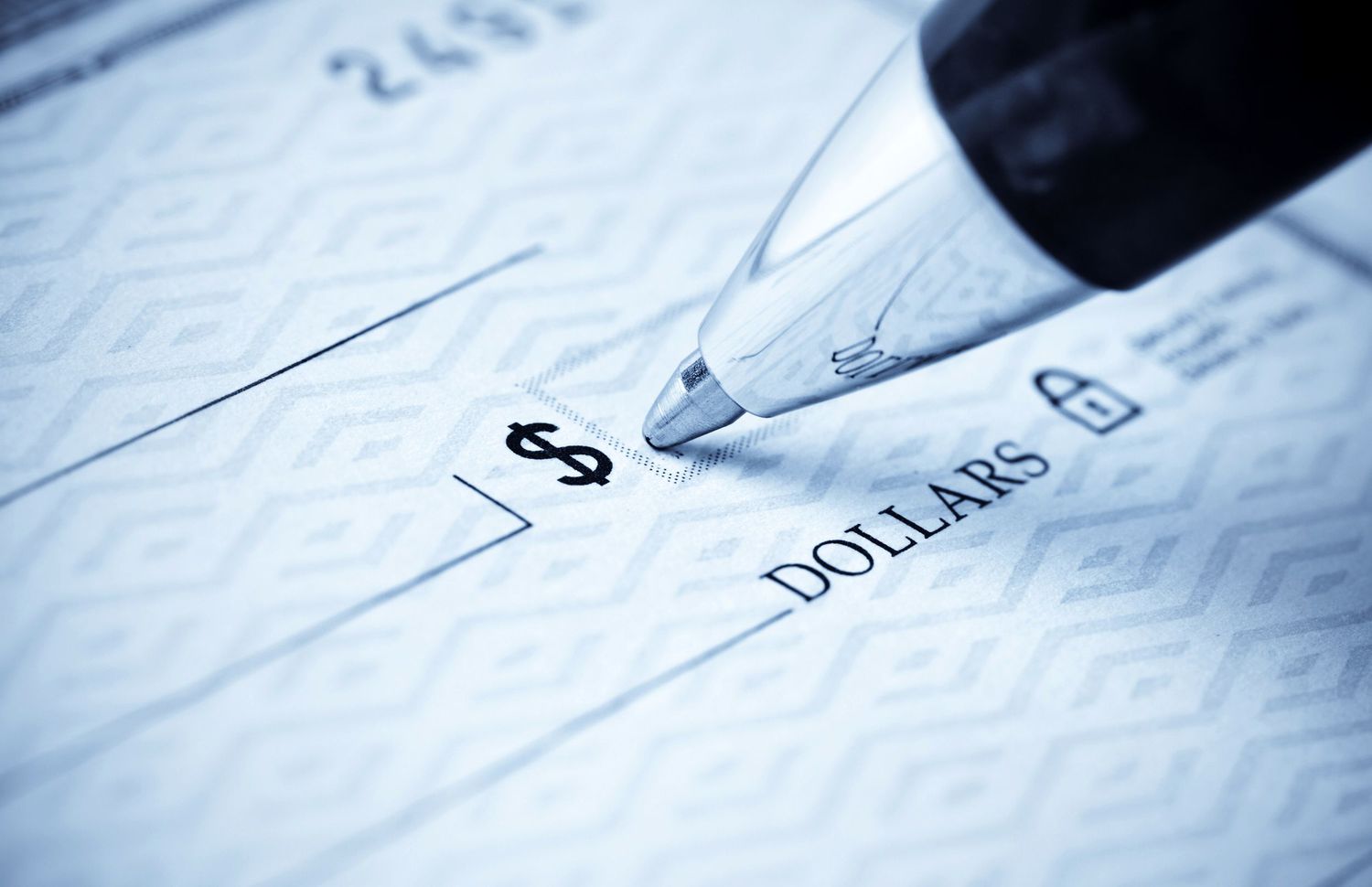 A pen and a check