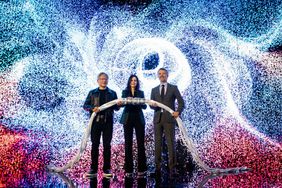 King Frederik X of Denmark (R), CEO and founder of Nvidia Jensen Huang (L), and CEO of the Danish Centre for AI Innovation A/S, Nadia Carlsten (C), symbolically switch on the new AI supercomputer named Gefion at the Vilhelm Lauritzen Terminal in Kastrup, Denmark, on October 23, 2024. 