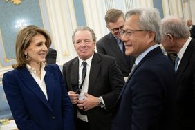 Alphabet chief investment officer Ruth Porat (L) and Nvidia CEO Jensen Huang (R) in Riyadh on Tuesday