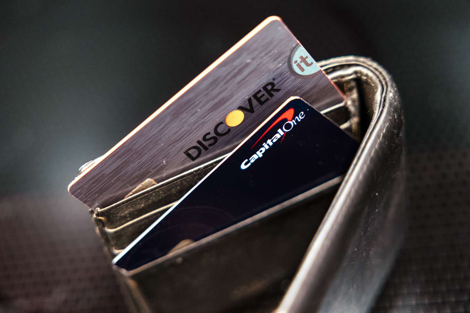 Capital One and Discover credit cards arranged in Germantown, New York, US, on Tuesday, Feb. 20, 2024. 