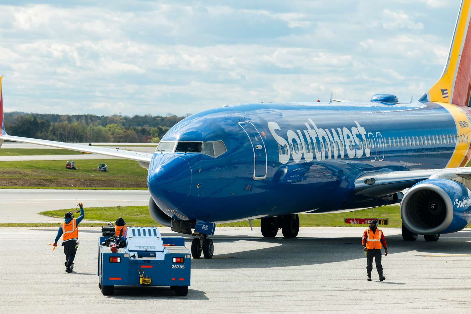 A Southwest Airlines Boeing 737-800 airplane is pushed back from a gate at Baltimore-Washington Airport 