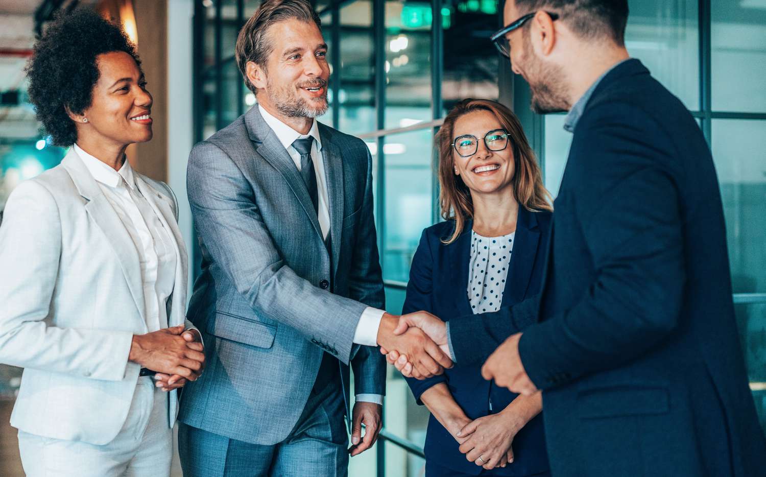 Colleagues discussing how to roll over a 401(k) from their old job to their new one