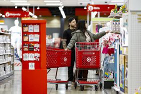 Customers examine a display at Target
