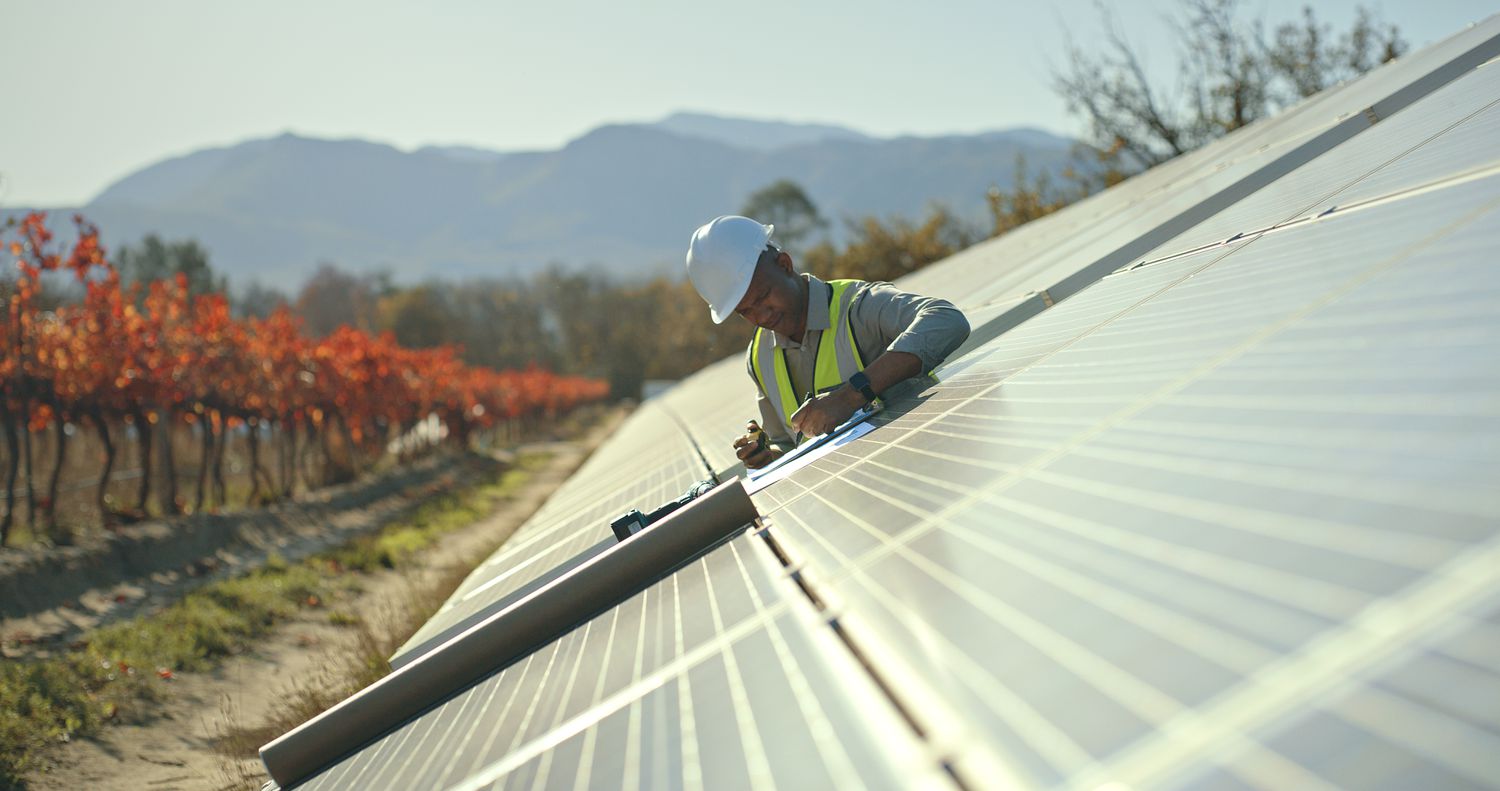 A man working on solar panels