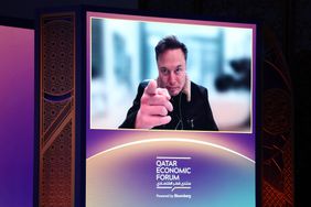 Tesla CEO Elon Musk on screen at the Qatar Economic Forum.